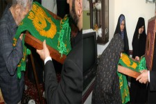 دیدار مسئولین شهرستان هرسین و خادمین حرم رضوی با خانواده شهید علیجانی