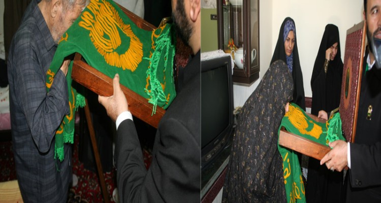 دیدار مسئولین شهرستان هرسین و خادمین حرم رضوی با خانواده شهید علیجانی