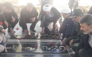 مزار شهدای هرسین در هفته بسیج گلباران شد